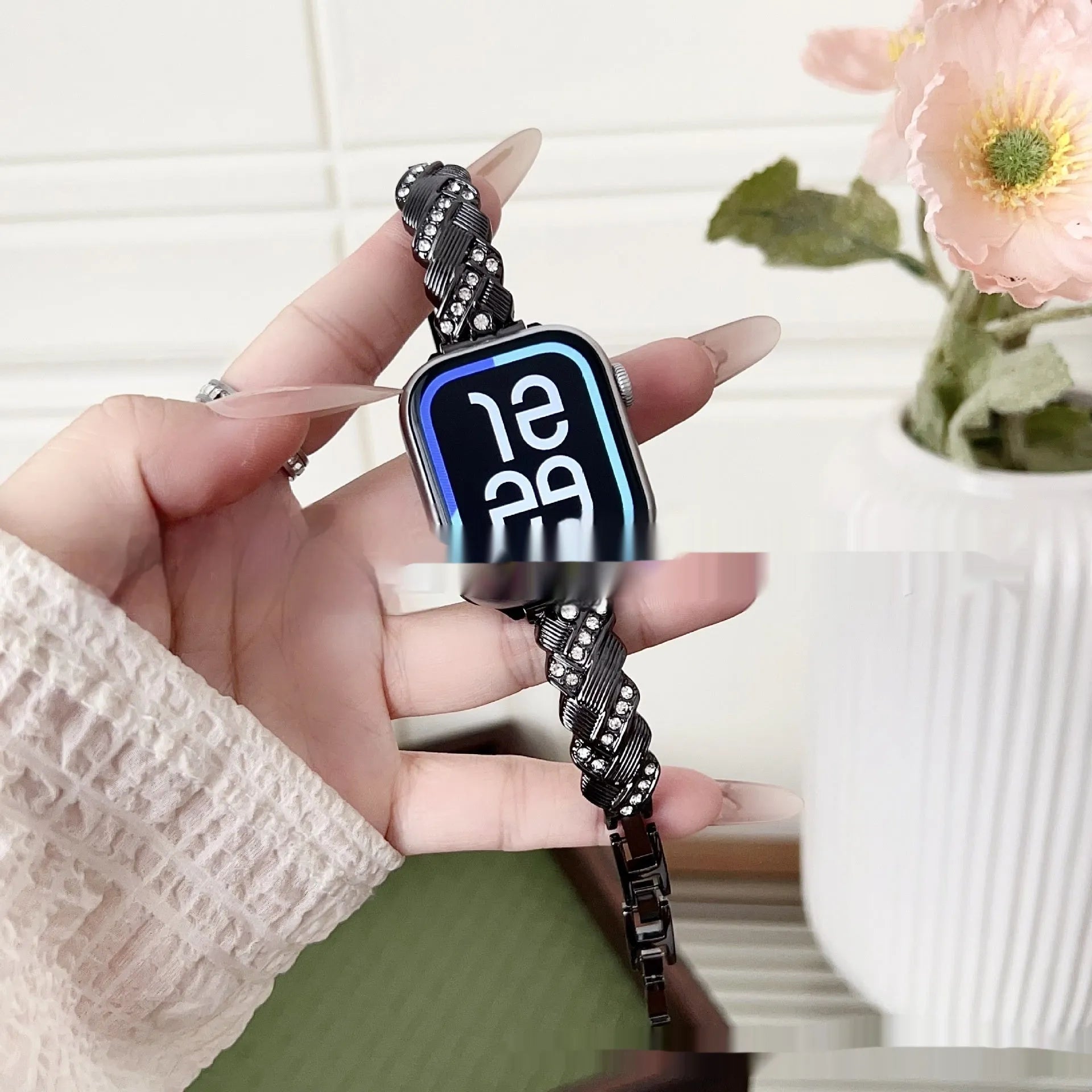 Close-up of a twist diamond pattern metal watch strap for Apple Watch in multiple colour options.