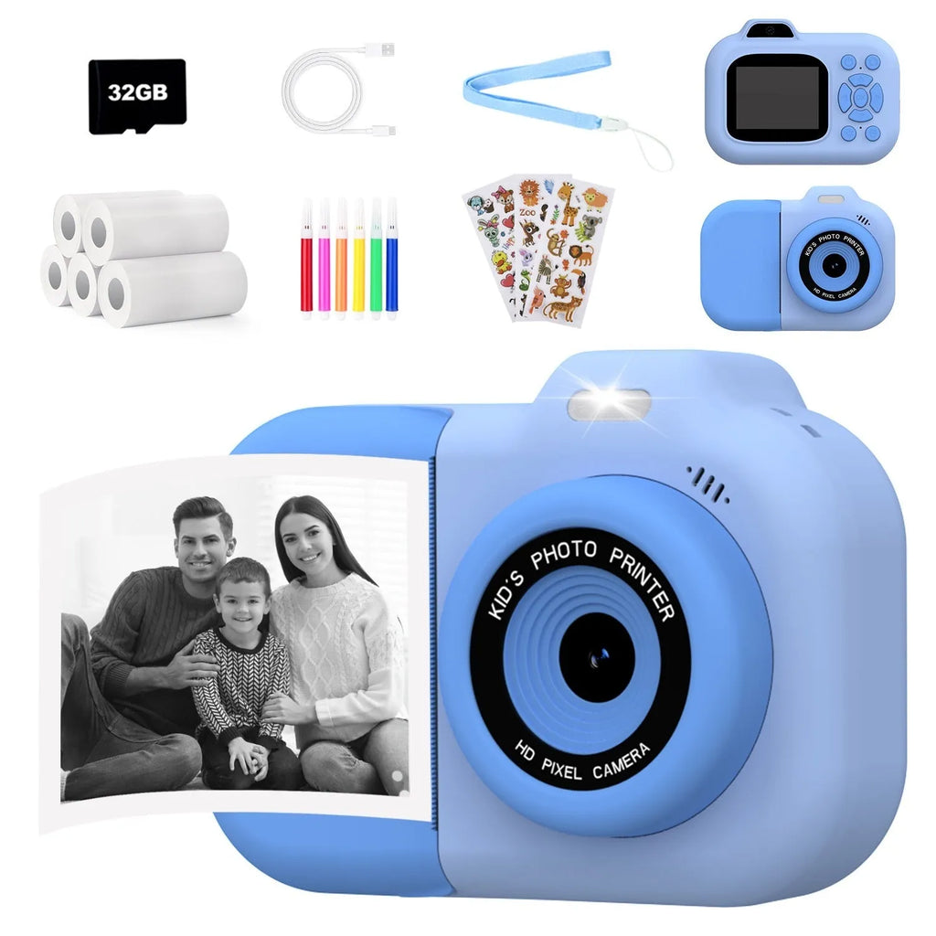 Blue children's digital camera toy with video recording, games, and photo sticker functions on a table.