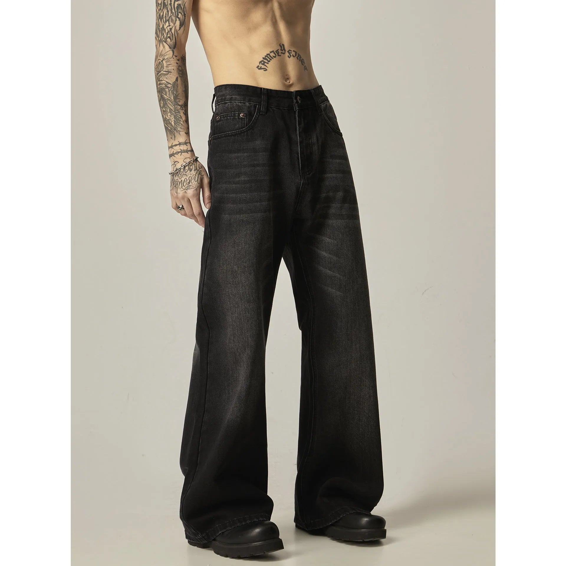 American retro black loose straight jeans with zipper fly on mannequin showing loose fit