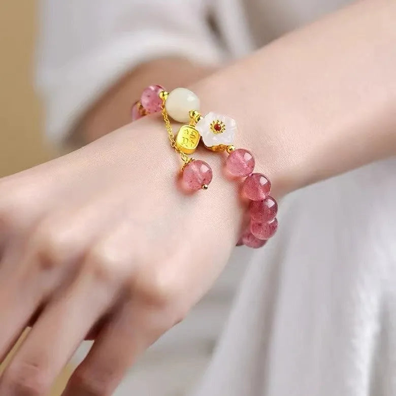 Handcrafted strawberry quartz crystal bracelet for women with natural style and multiple charm options
