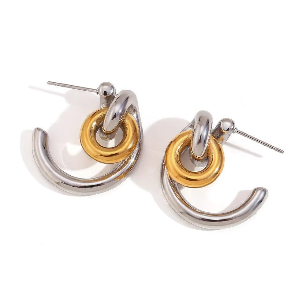 Gold electroplated women's jewellery set with geometric earrings, bracelet, and necklace on stainless steel