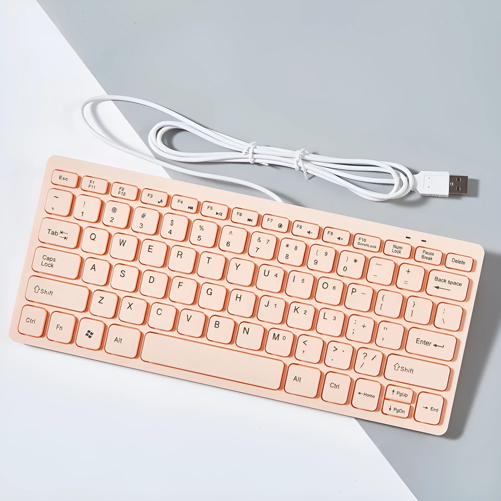 USB wired mini keyboard in black with compact 280mm width and noiseless keys for laptop use