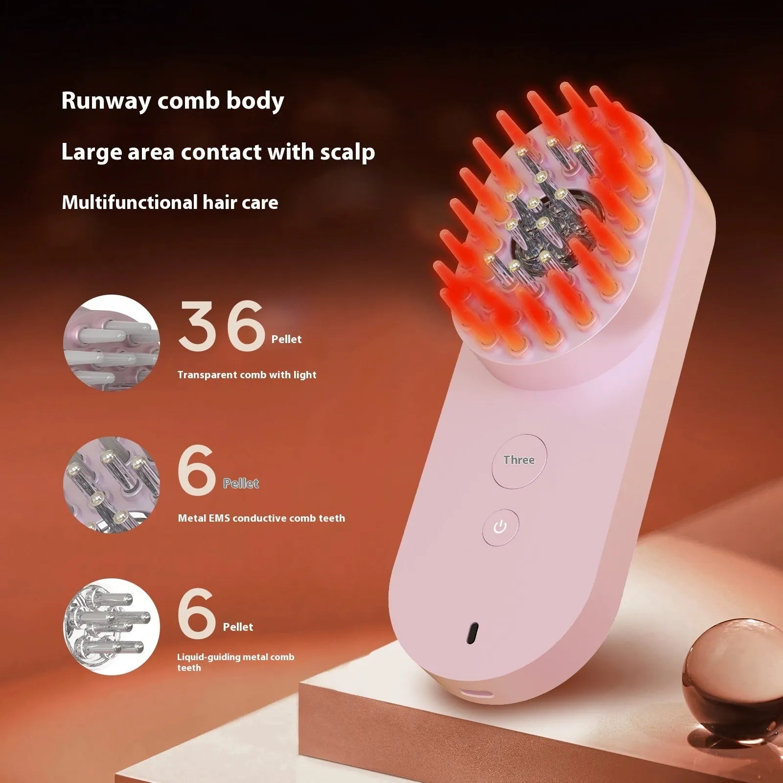 Smart massage comb with red light therapy function in pink colour