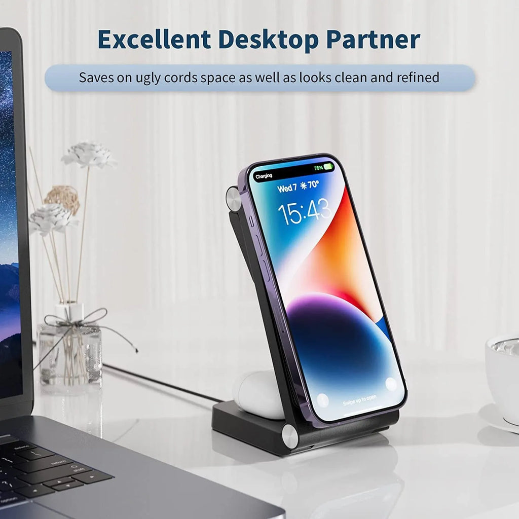 New vertical folding magnetic three-in-one wireless charger in black on a desk charging a smartphone, watch, and earbuds