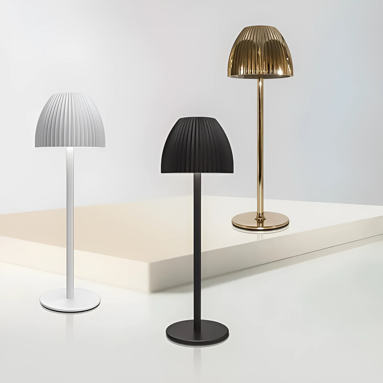 Modern dimmable USB rechargeable desk lamp with thin round base in black or white colour