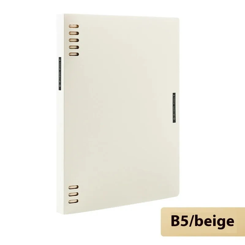 Refillable loose-leaf spiral notebook with PP cover open, showing raw wood pulp paper in grid ruling.