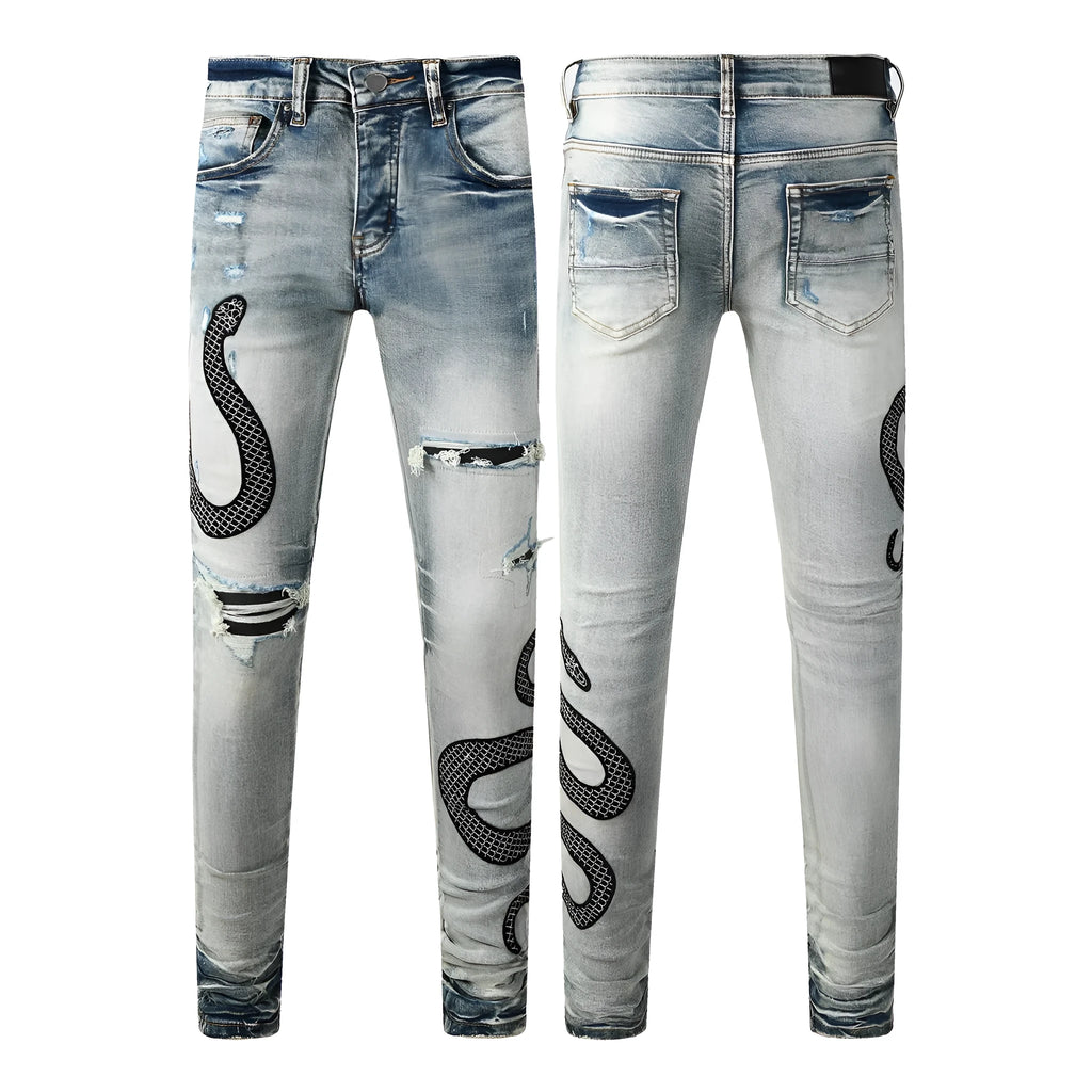 Blue distressed skinny jeans with a mid-waist and button-fly opening on a neutral background.
