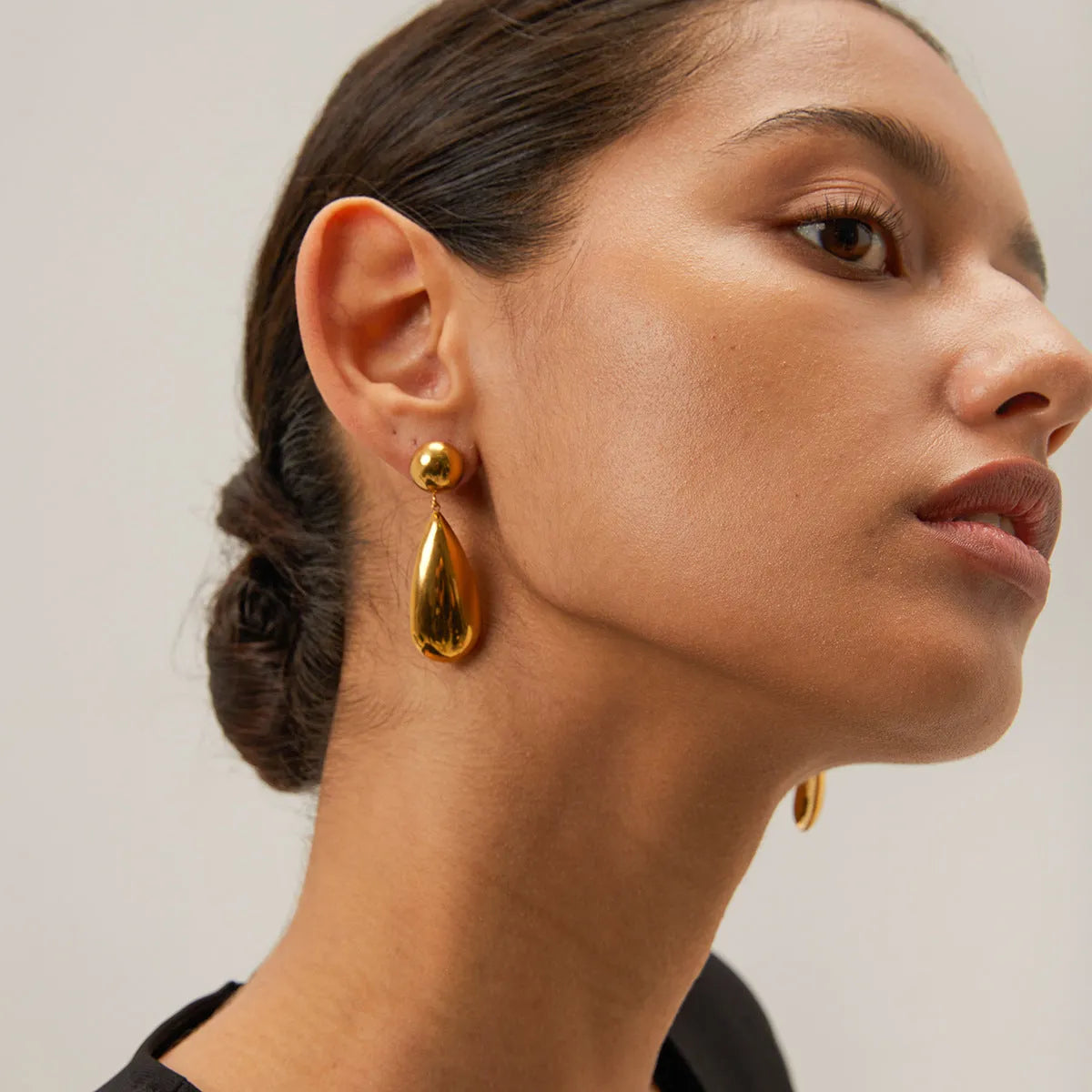 Gold stainless steel water drop pendant earrings with geometric hemisphere design for women