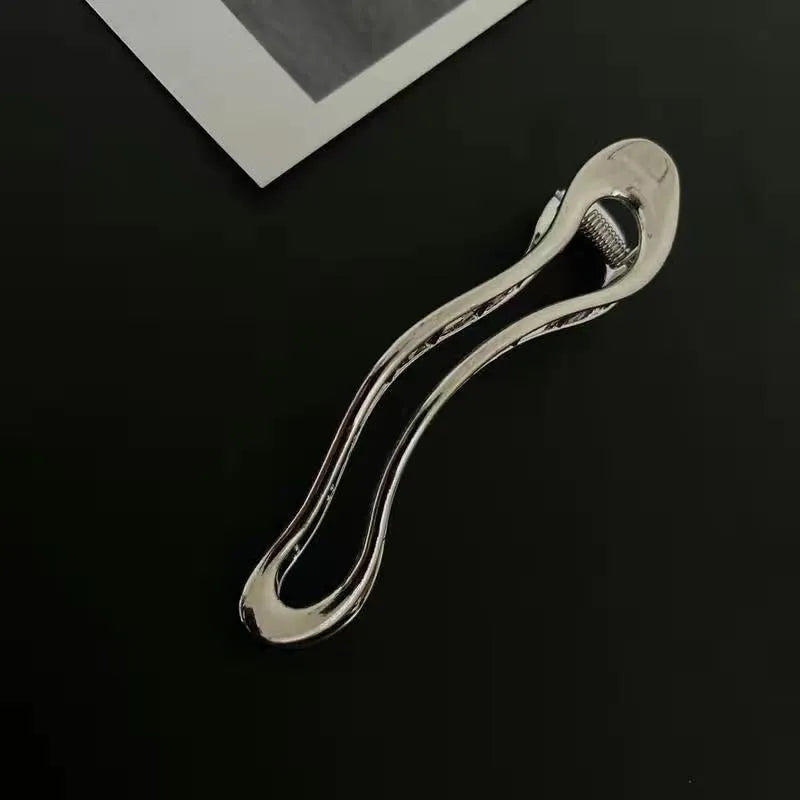 Zinc alloy hair barrettes in geometric shapes with gold and silver polished finishes