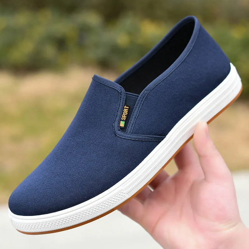 Men's low-top canvas slip-on shoes in BK Black colour with round toe design