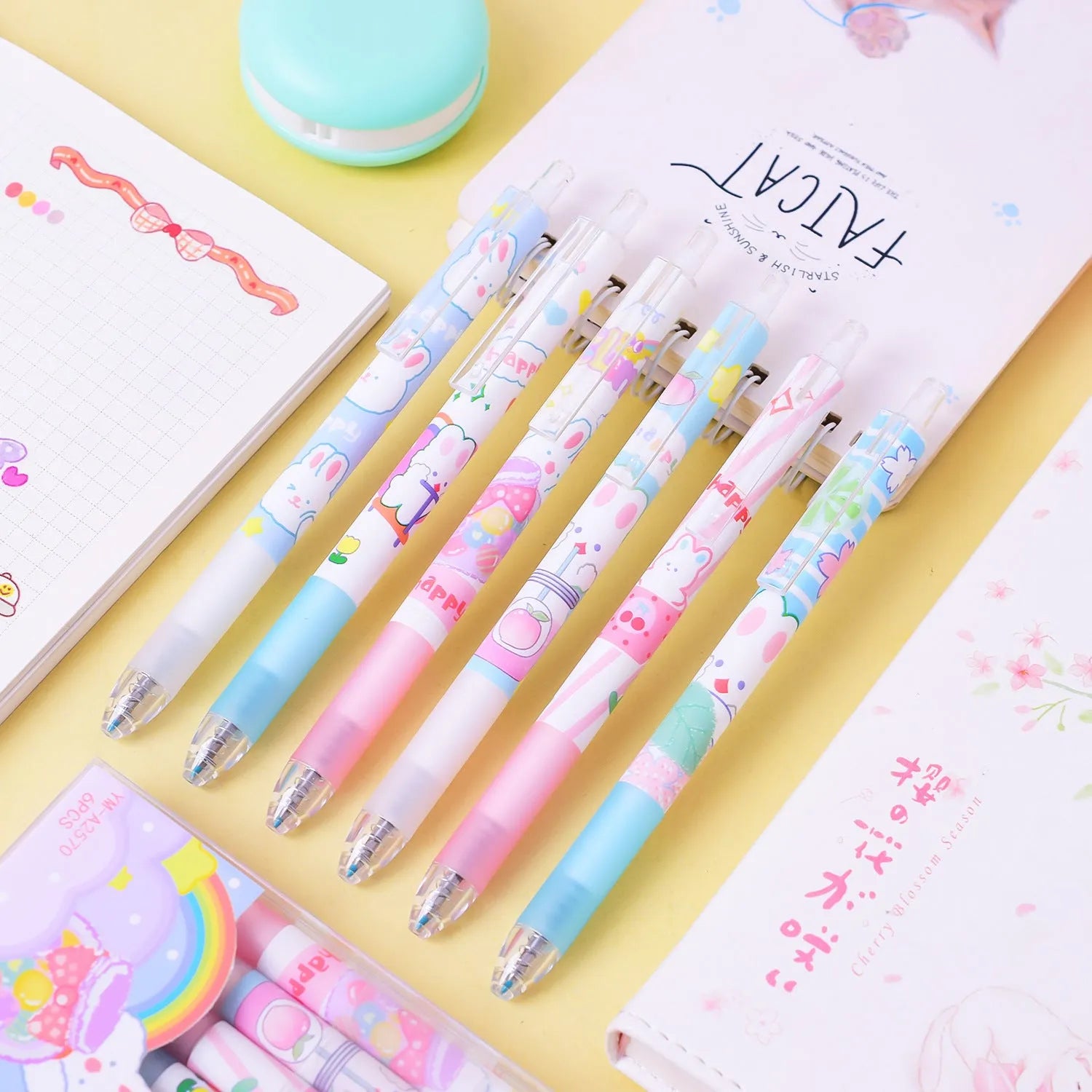 Six black signature pens with cartoon bunny designs and 0.5mm fine tips for writing