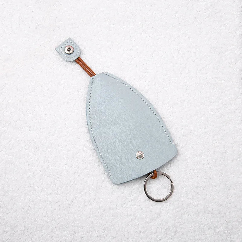 Cartoon design pull-out car key case made from soft PU leather, showing approximate size.