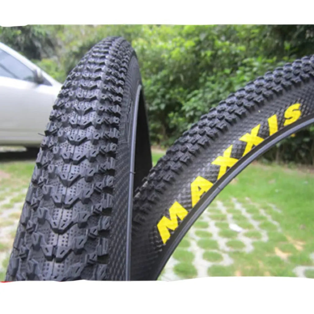 Ultralight mountain bike tyre with tread pattern shown, available in multiple sizes including 26, 27.5 and 29 inch diameters.