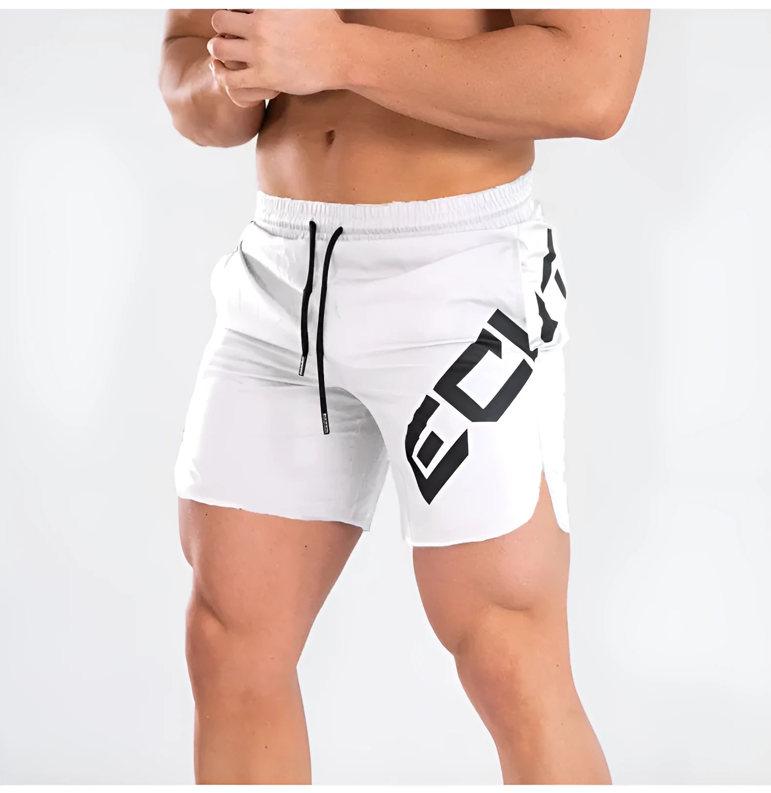 Man wearing black knee-length nylon running shorts during summer training.