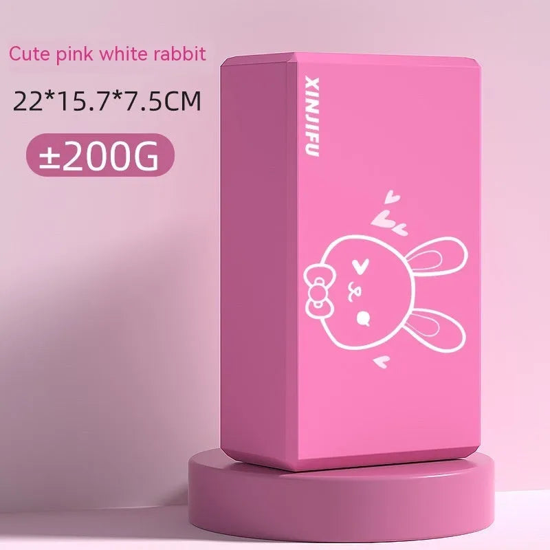 High-density EVA yoga block in pink next to a dark blue block, showing 7.5cm height and printed cartoon design options.