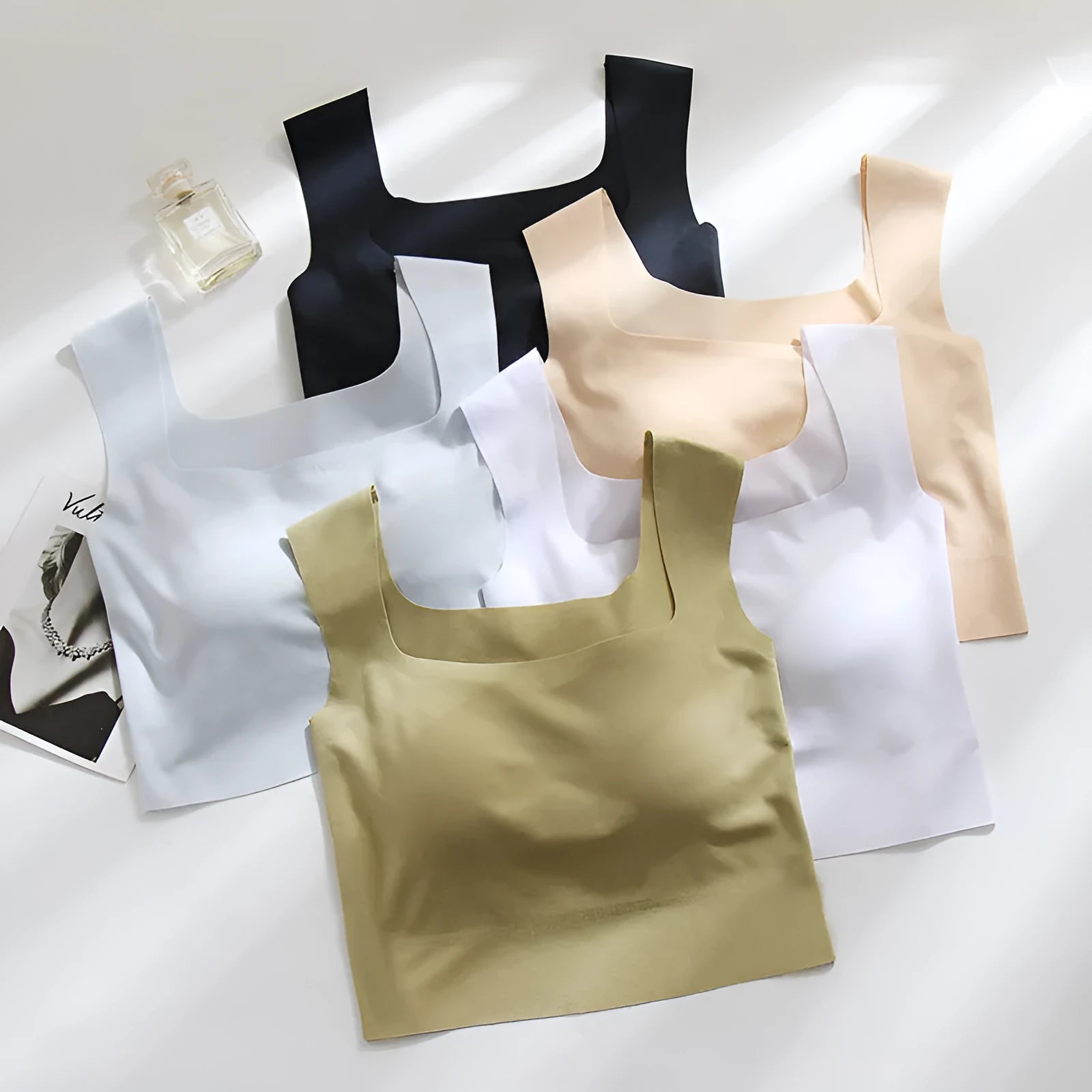 Women's non-marking nylon sling vest with chest pad in light blue, shown from the back.