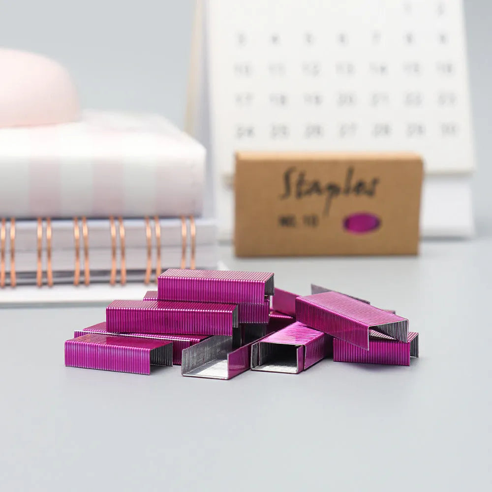Box of 1000 metal office staples in black purple rose gold and rose red colours