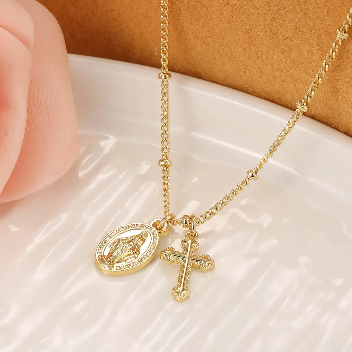 Gold Virgin Mary and cross geometric pendant necklace on a chain