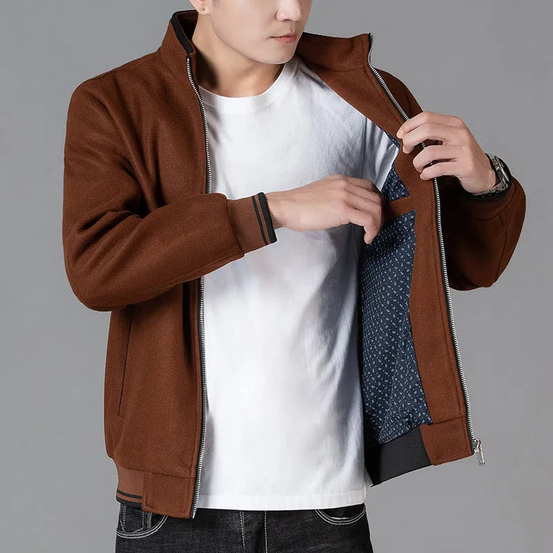 Men's grey polyester fleece autumn jacket with side pockets, shown in a sports-style casual fit.