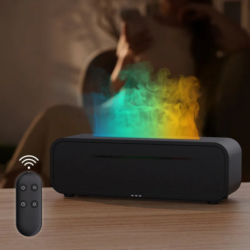 Black and white USB essential oil aroma diffuser with colour-changing light and remote control on a desk