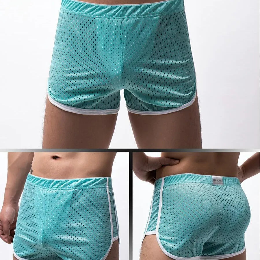 Men's black three-point boxer shorts made from a knitted cotton and nylon fabric.