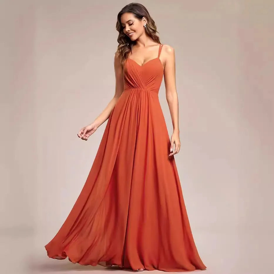 Women's long sleeveless A-line pleated dress in light green for banquet or casual wear.