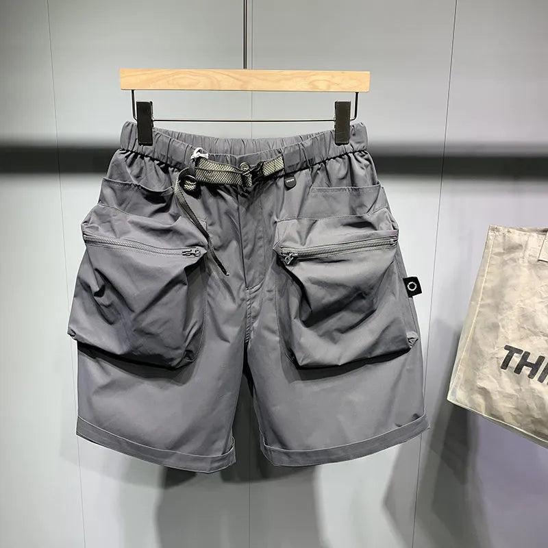 Large size men's black work shorts with pockets and straight leg hem