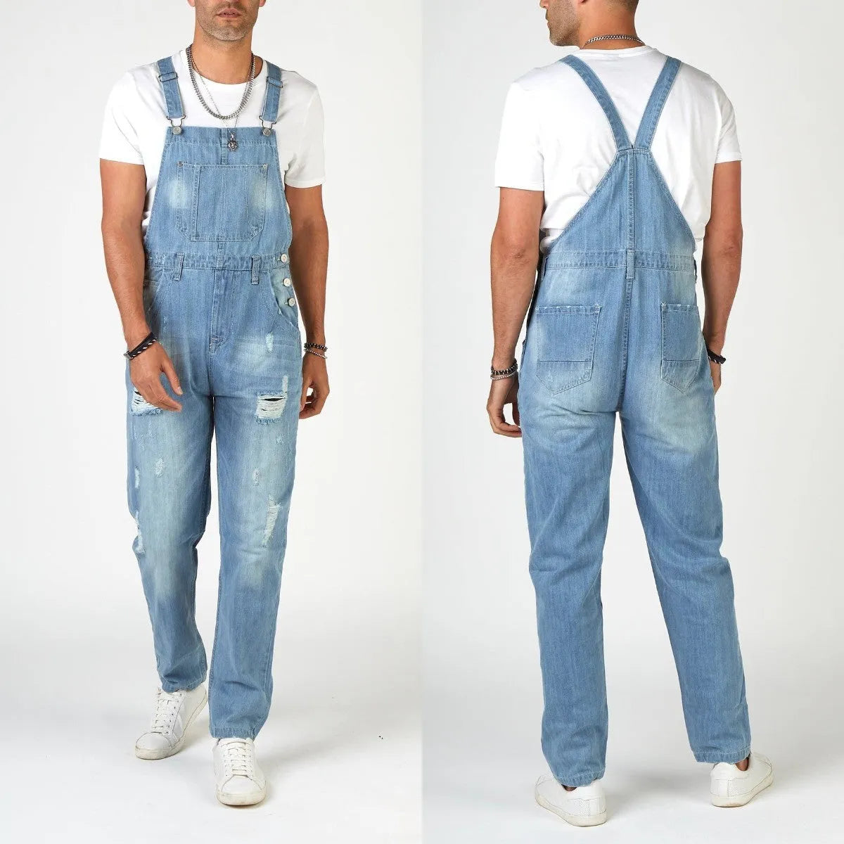 Light blue men's ripped suspender jeans with high waist and straight legs showing button fly and adjustable braces