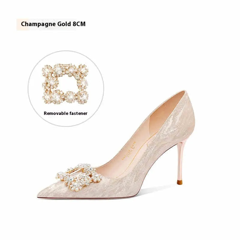 Champagne gold women's pointed-toe stiletto heels with rhinestone detail on the upper.