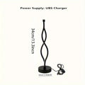 Black aluminium desk lamp with touch dimming controls and three-colour adjustment button