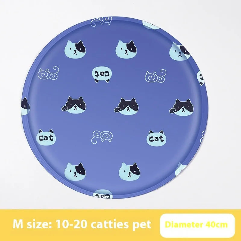 Round cartoon-design pet cooling mat for dogs on a floor, showing beige and blue colour options.