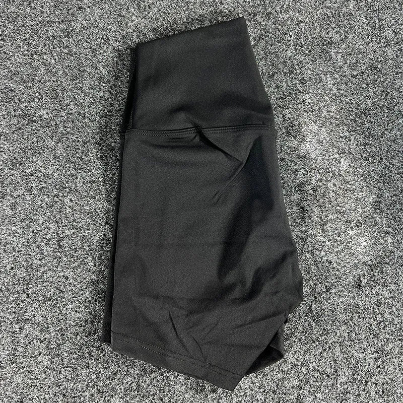 Ladies high-waisted yoga shorts in nylon fabric, shown in one of 16 available colours.