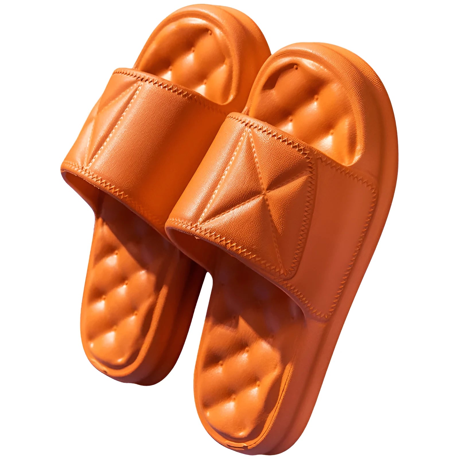 A pair of thick-soled EVA bathroom slippers in a selected colour, showing the non-slip sole pattern.