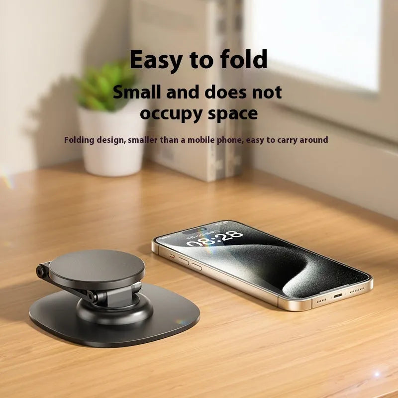 360 rotating foldable phone stand in black ABS material on a desk for live streaming
