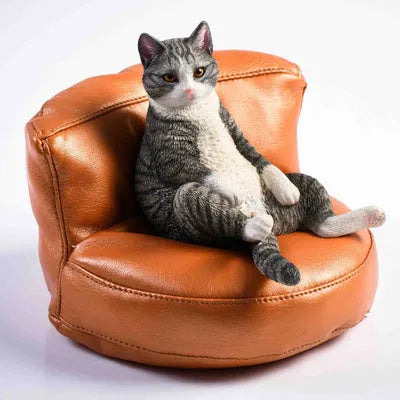 Lazy cat ornament and fabric sofa model set for car dashboard, 7.5cm high.