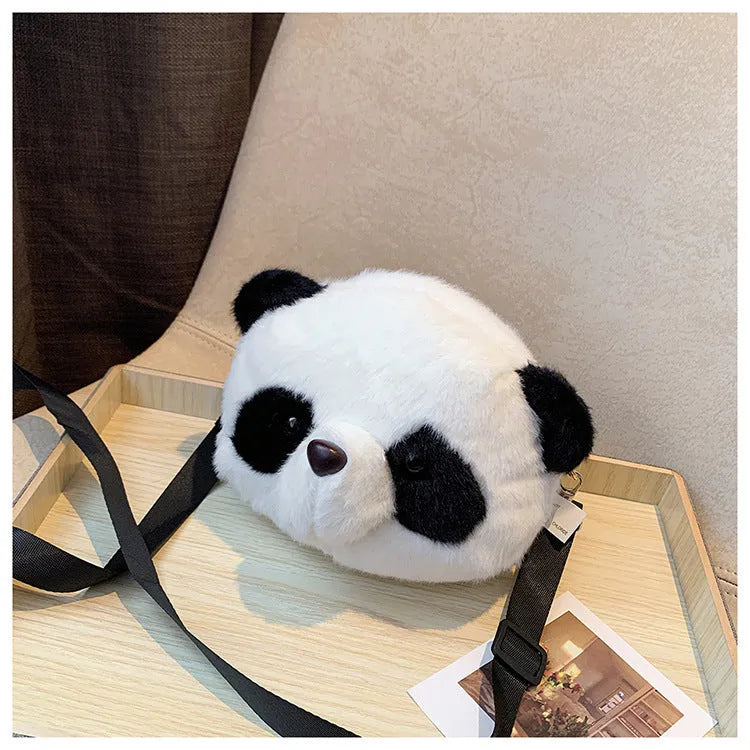 Soft plush cylindrical crossbody bag with panda head design, showing sandwich pocket.