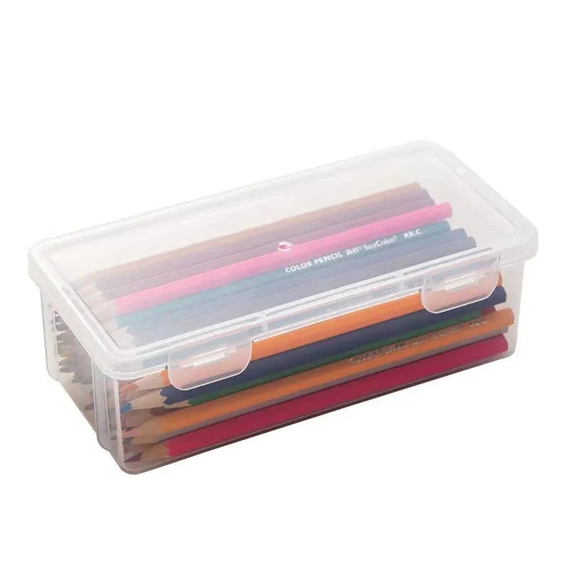 Clear plastic pencil storage box filled with coloured pencils and crayons