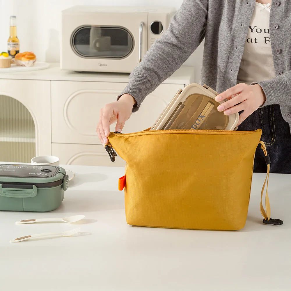 Japanese style insulated lunch bag in Oxford cloth, shown in grey, black, yellow, and army green colours.