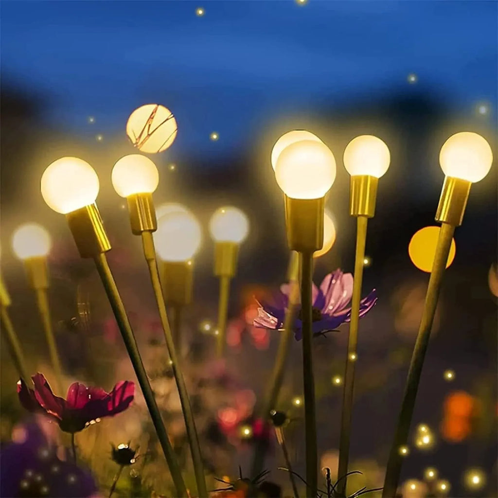 Solar-powered LED garden light with ground spike showing automatic light control for dusk-to-dawn operation