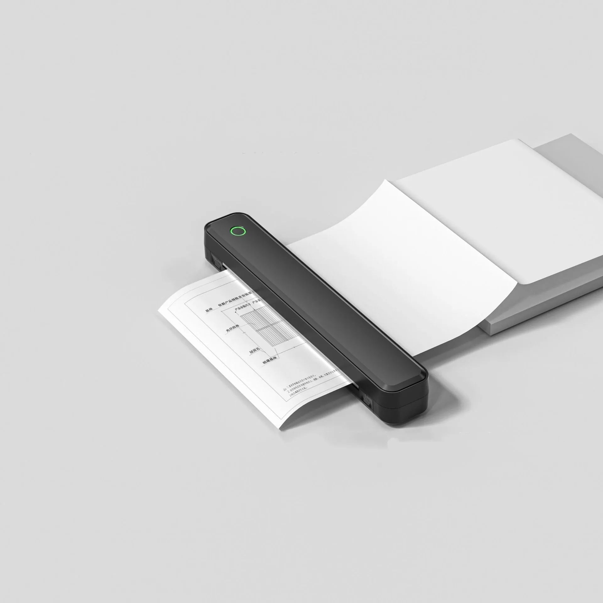 Compact black and white Bluetooth thermal printer for mobile phone printing.