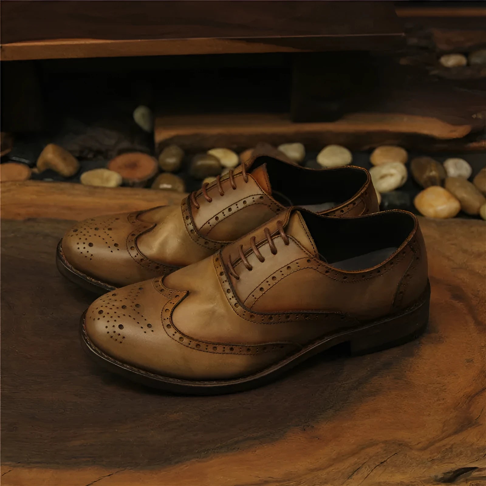 Men's light brown vintage distressed leather casual shoes with engraved detailing and round toe.