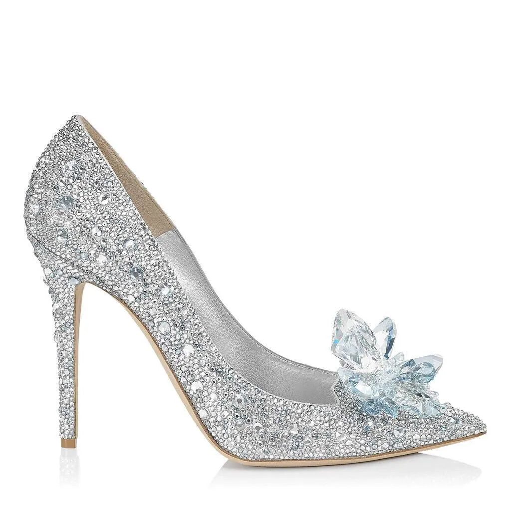 Gold women's pointed toe stiletto high heels with rhinestone and sequin decoration on a shallow-mouth, low-top upper.