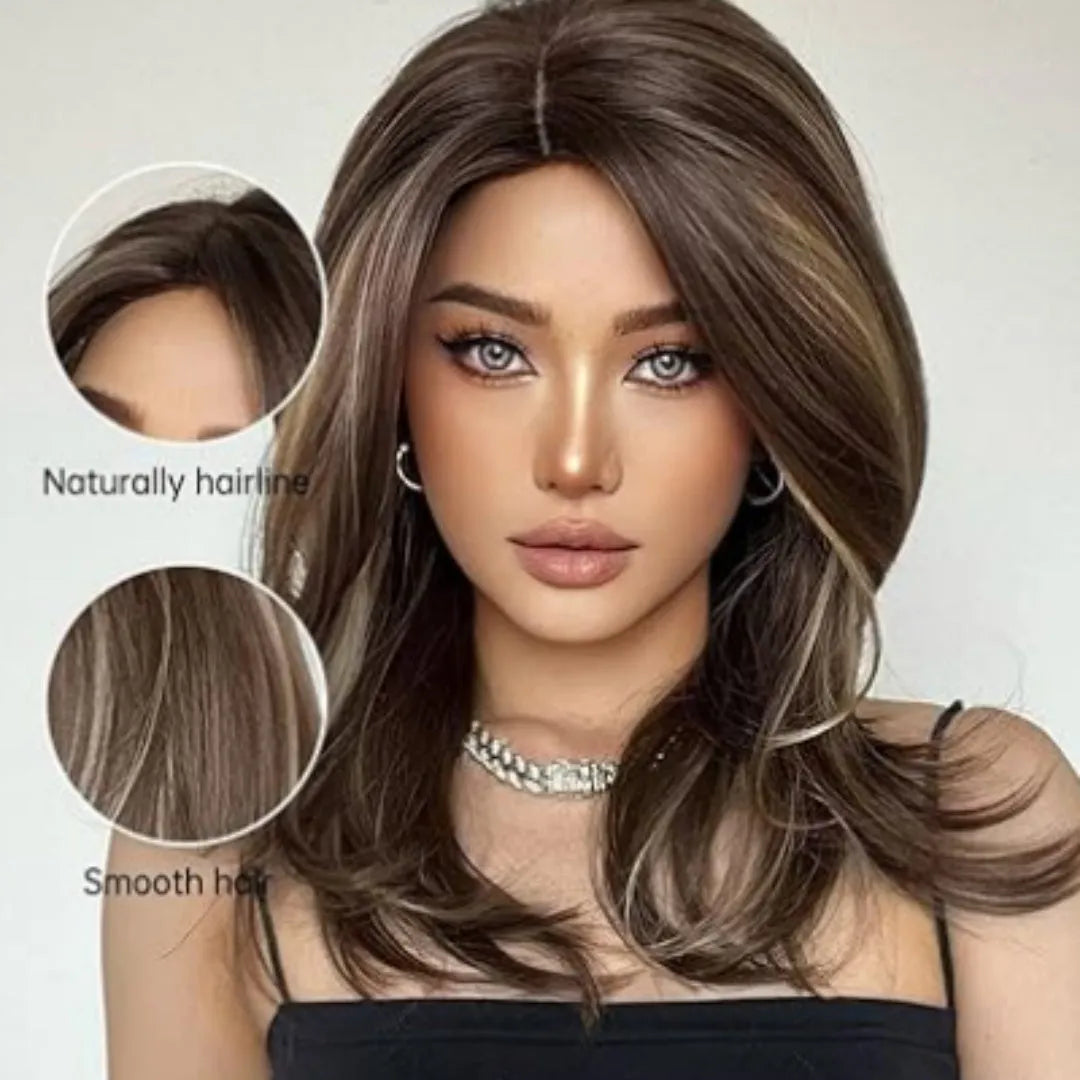 Mid-length curly full-head synthetic wig with long bangs in a platinum gradient colour.