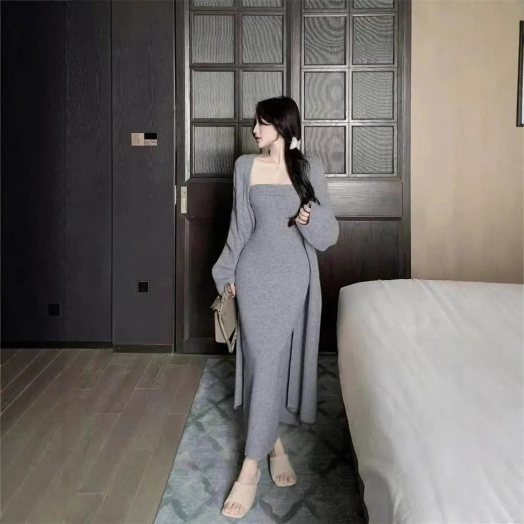 Women's grey knitted cardigan dress sweater suit two piece set with long skirt and regular sleeves.
