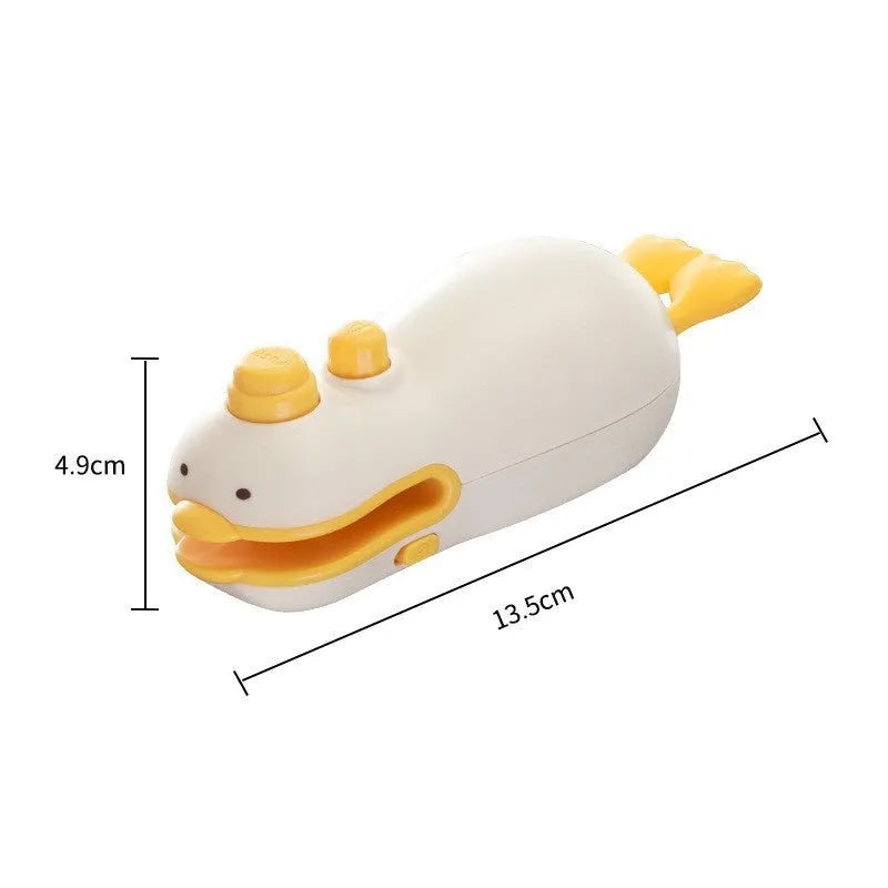 Small yellow duck animal jacquard design rechargeable handheld sealing machine with USB charging cable.