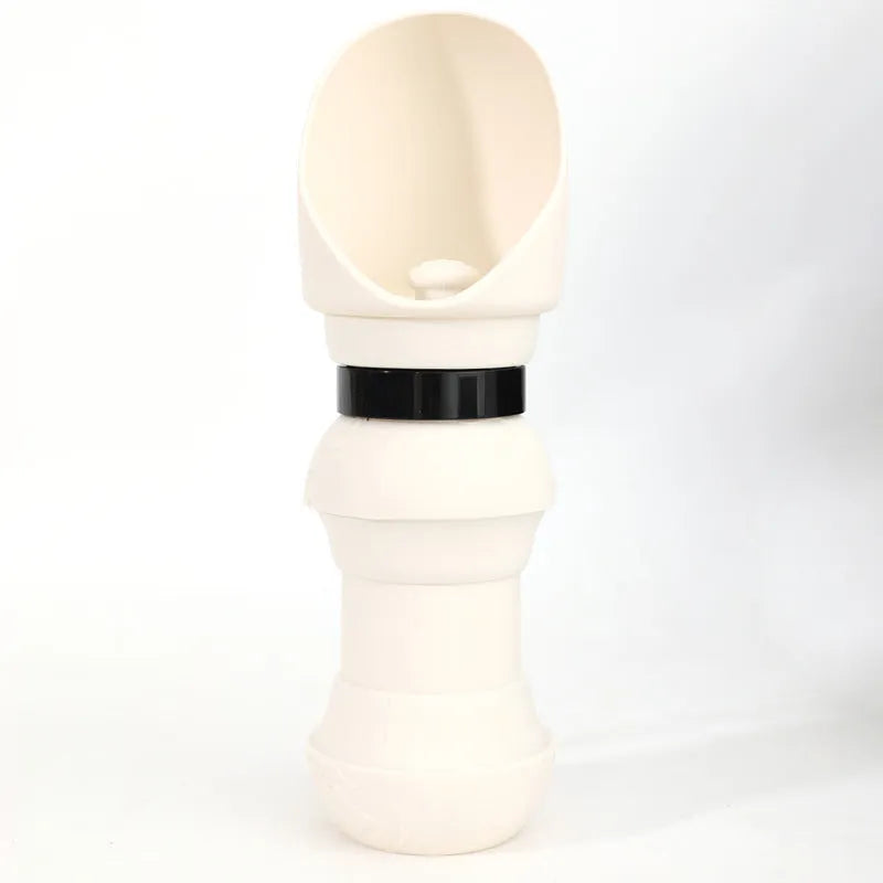 A folded flat and an unfolded silicone pet travel bowl showing its collapsible design.