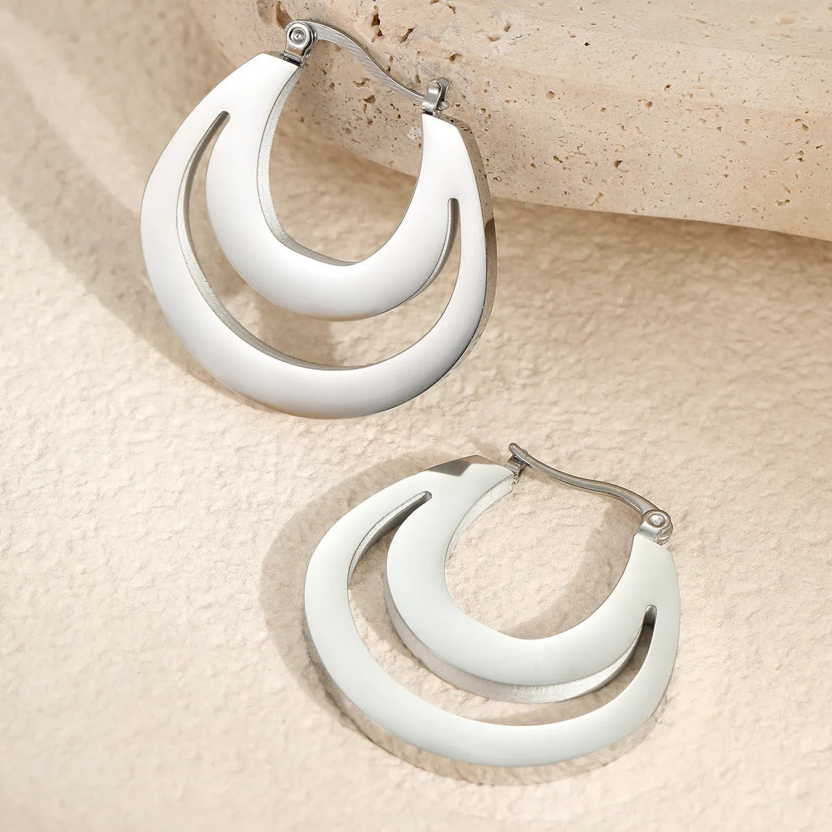 Geometric French earrings with 18K gold plating on stainless steel in minimalist round ring design