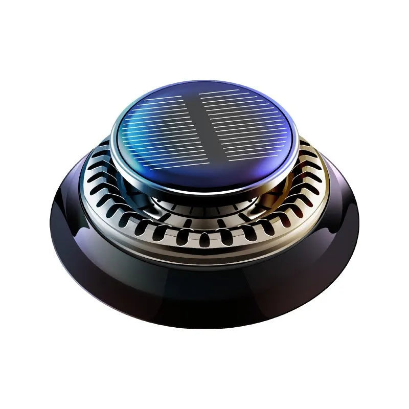 Solar-powered kinetic car air freshener with rotating double rings on a car dashboard.