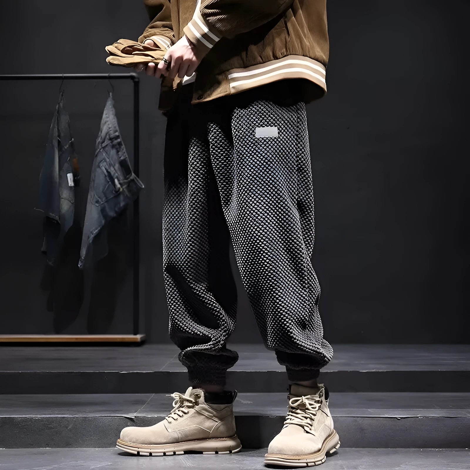 Men's grey ankle strap sweatpants with straight leg cut on mannequin