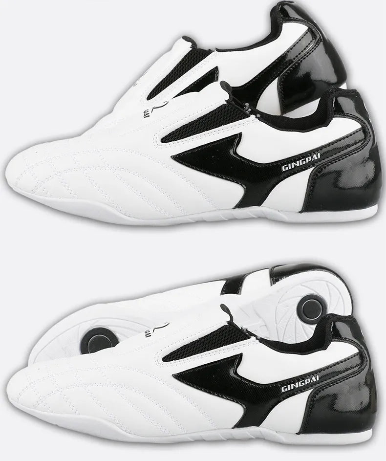 Black and white children's boxing shoes with soft bottom construction for martial arts training